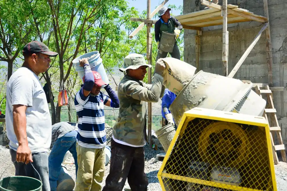 Pile of UltraTech cement bags on a construction site in Bangalore